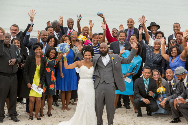 Fun group shot with newlyweds and their guests!